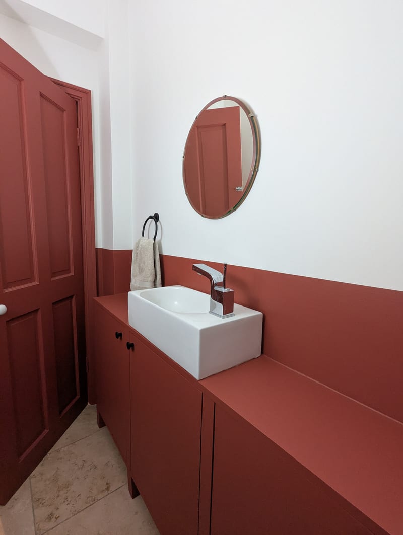 Downstairs WC after — wall finish detail